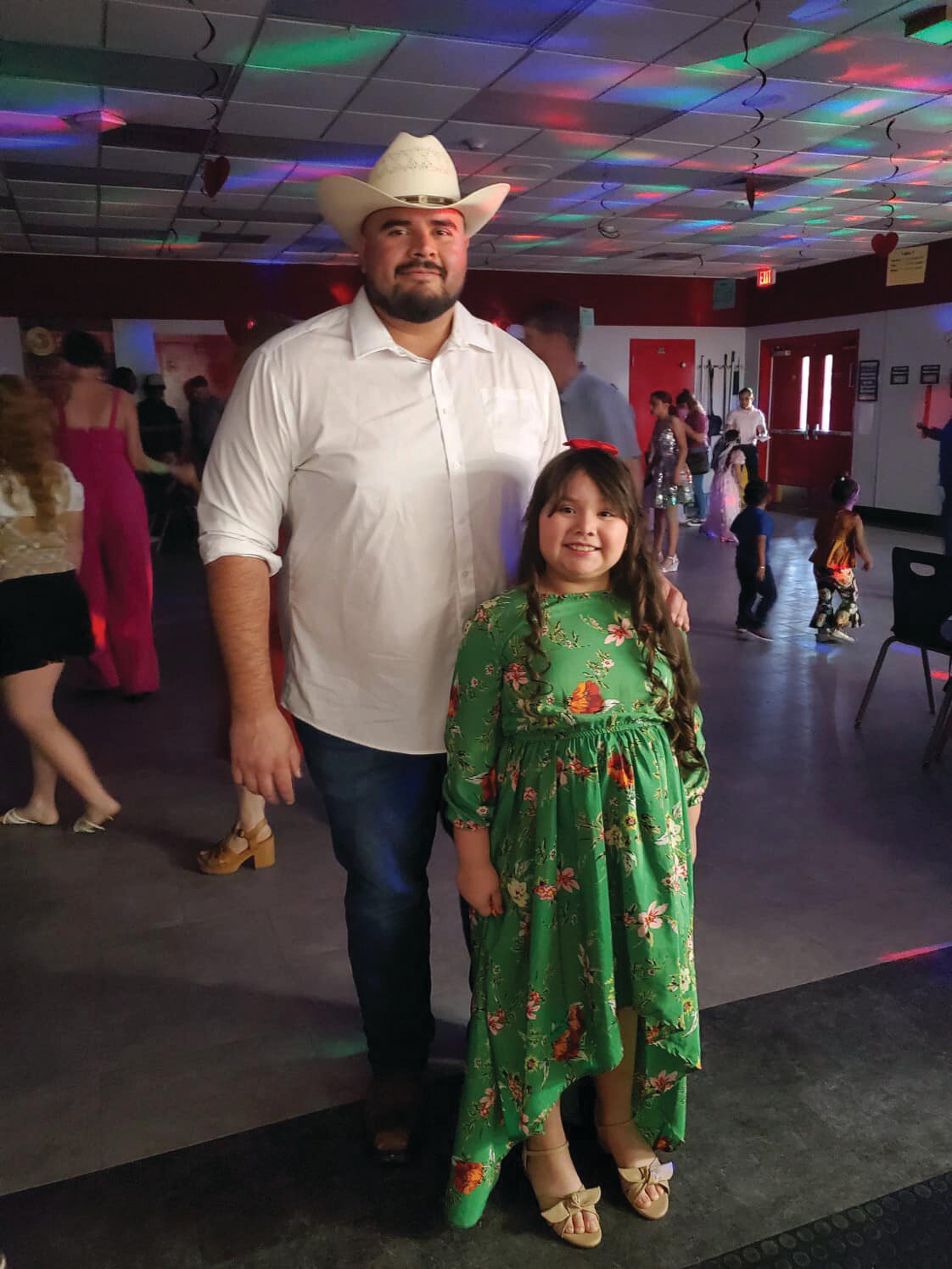 LABELLE -- Upthegrove Elementary School students and their parents enjoyed a Parent/Child Dance on Feb. 15. [Photo courtesy Upthegrove Elementary School].